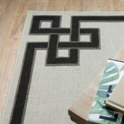 Trinity Corner Detail Border Patio Area Rug Beige/Black - Captiv8e Designs -Safavieh Outlet Store GUEST 05cfc1b2 753d 48fc b237 cf6873f791c2